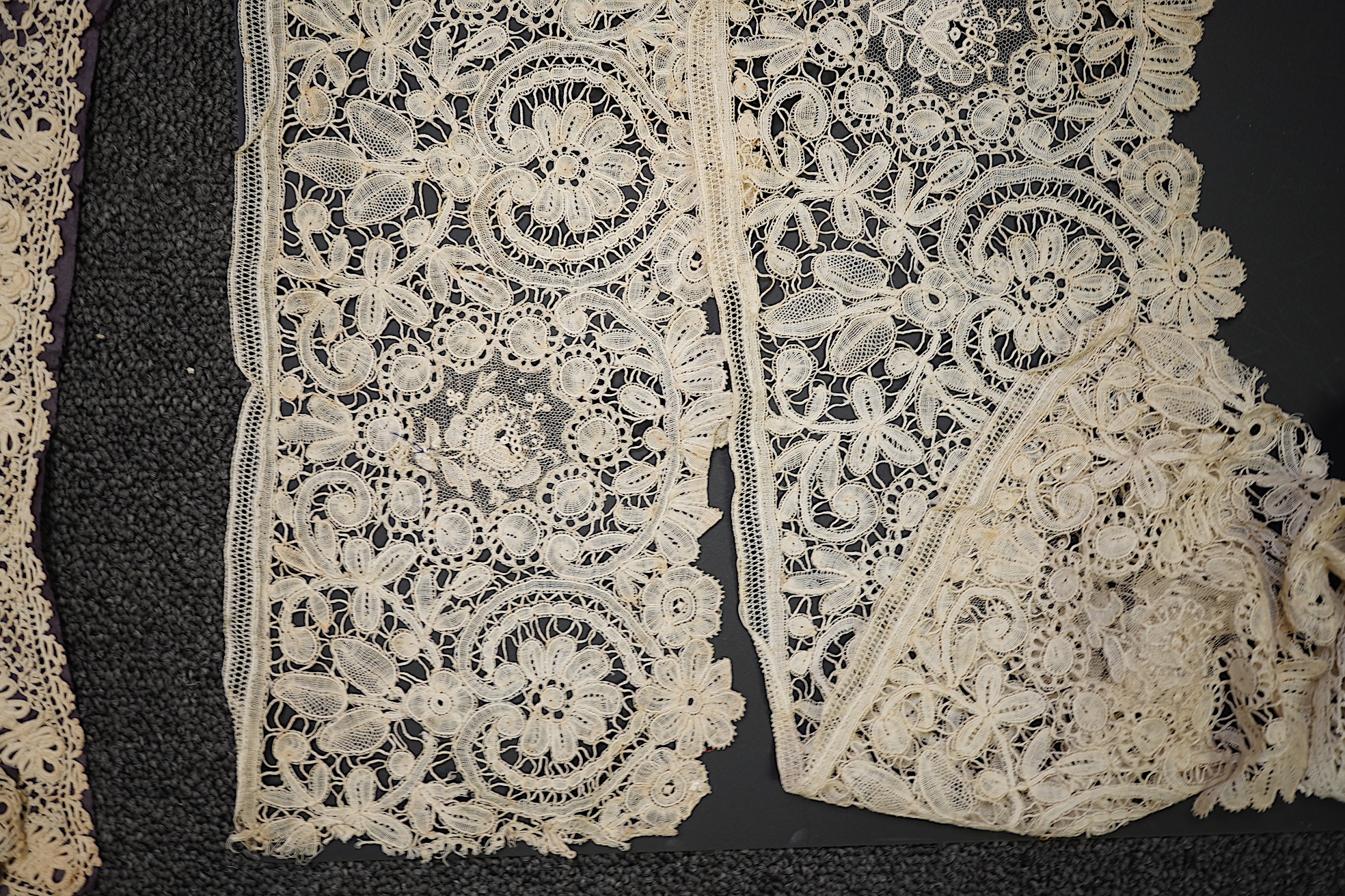 A mixed Brussels bobbin lace and Point de Gaze lace collar, another smaller collar, a similar length of trim and butterfly motif, together with a Brussels bobbin collar and trim, an Irish crochet cuffs, a Valenciennes la